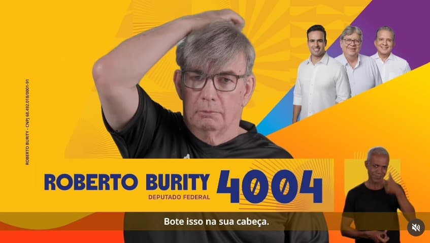 Com peruca e trocadilho, candidato viraliza em propaganda eleitoral: "bote isso na cabeça"